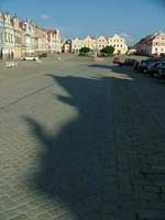 Afternoon shadows inch ascros the main square of Telc
